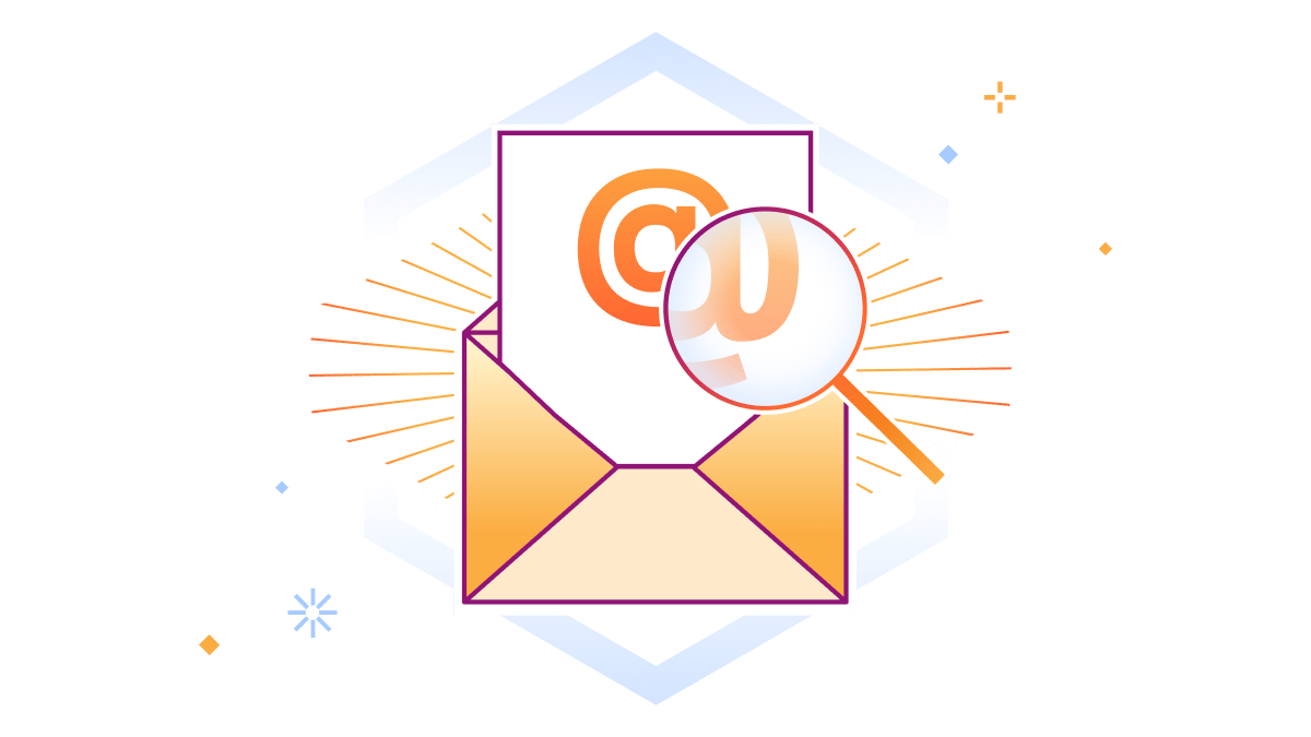 Le symbole arobase de l’e-mail est agrandi par une loupe